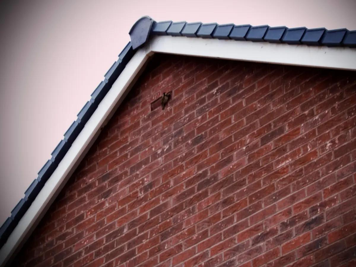 Brick gable finished with a dry verge system