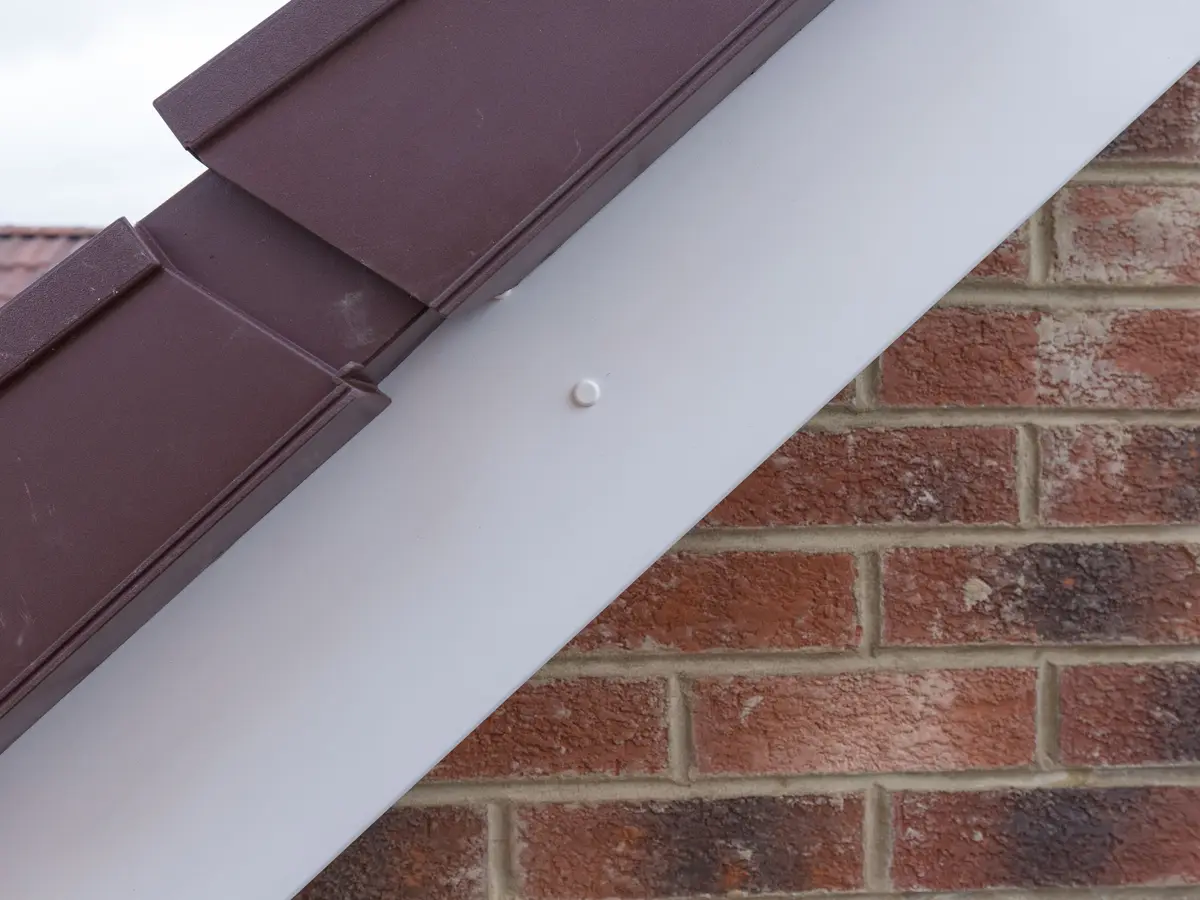 Dry verge units fitted along a brick gable