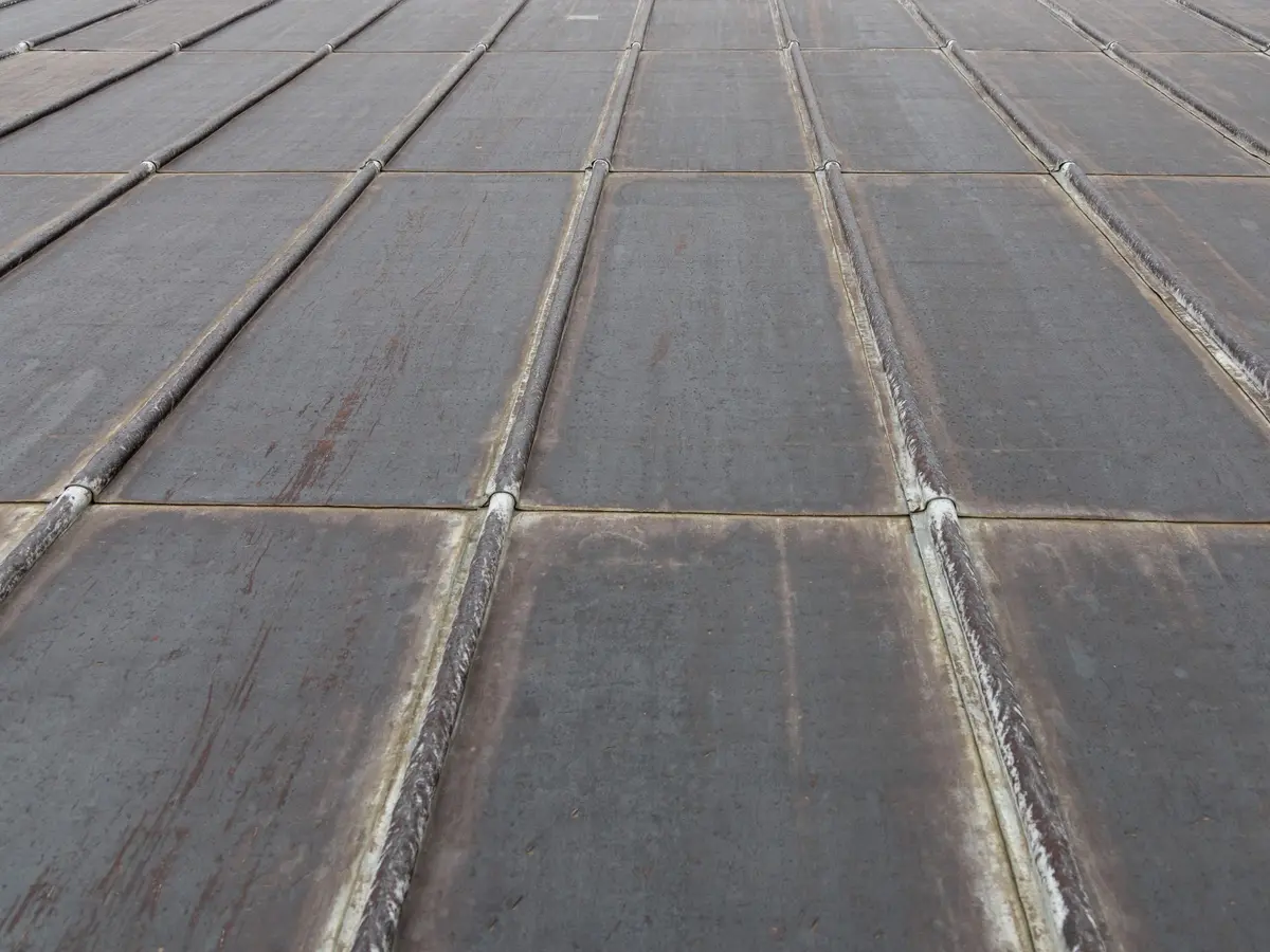 Lead sheet roof with traditional rolls